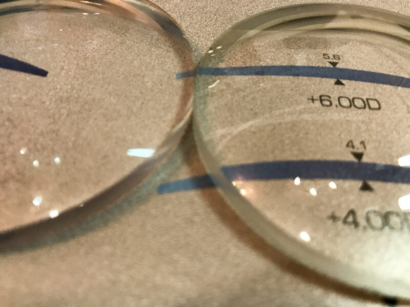 Progressive prescription lenses showing add power markings that can pass lab tolerances but still cause patient non-adaptation