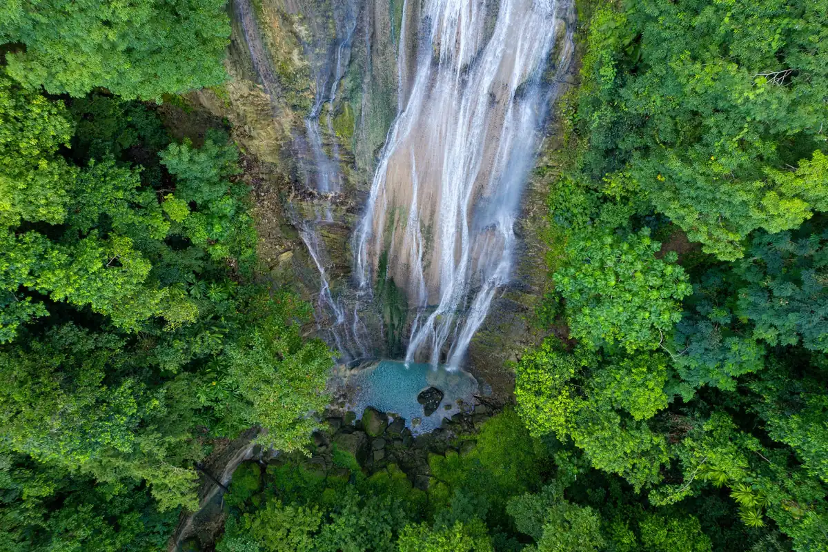 Aerial view of a waterfall in the rainforest of Portland Parish, Jamaica